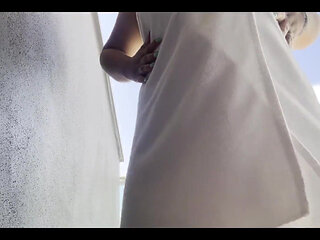 A Sexy Tourist at a Hotel After a Shower Got Aroused and Masturbated on the Balcony.