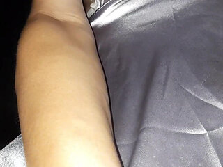 Masturbating wearing satin silver long dress in car