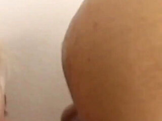 Angela Stone takes two cocks and blows them up
