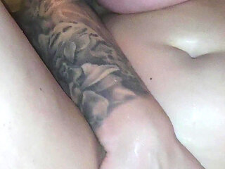 Busty Girl Masturbates with a Glass Dildo in a Public Sauna in Front of Others.