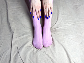 Pink Socks in Hands of Mistress with Blue Nails in Solo Video
