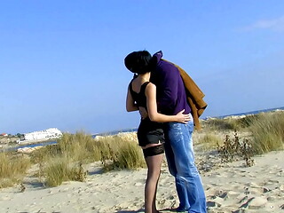 Brunette milf in stocking fucked on a beach