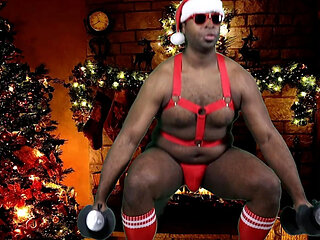 Sexy black Santa works out before jerking his big stocking stuffer