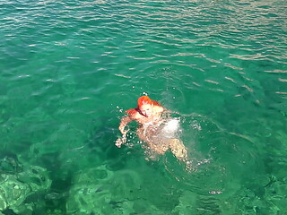 Blue water and a naked girl!
