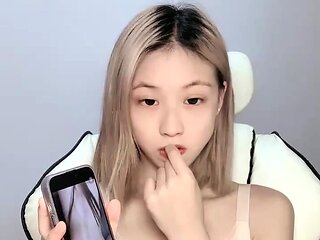 Amateur webcam slut shows tit on cam