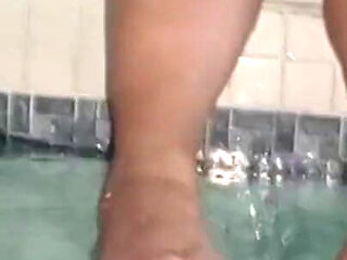 Foot Fetish My Stepmom Models Them in the Hotel Pool