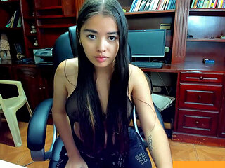 The secretary whore masturbates her anus when the boss isn't around