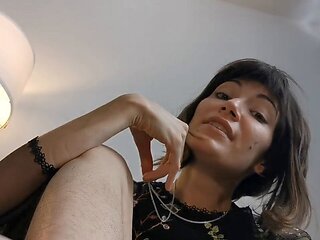 Dominatrix Nina Yo humiliates her foot worshipping client