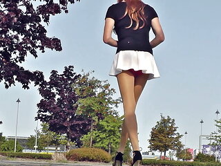 Public Crossdressing... Sissy in very short dresses outside