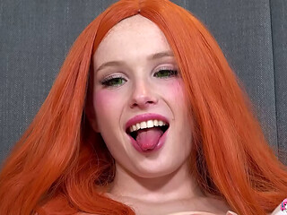 Horny slutty redhead Arielka fingers her shaved pussy and enjoys it with a sex toy.