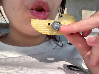 Giantess Girl Finds a Tiny Man in Her Bag of Chips and Is Surprised, but She Eats the Tiny