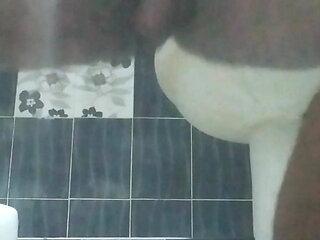 I masturbated alone in the bathroom late at night.