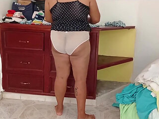 Chubby Girl Tidying the Room and Folding Clothes