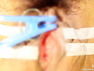 Sucking and pinching the clitoris.