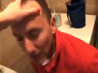 Footjob wife makes him lay down in the bathroom