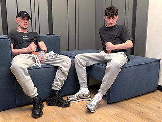 Two guys jerking off together