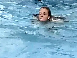 Meche Miley straitjacketed in pool