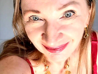 Hottest GILF ever with huge tits teasing in red