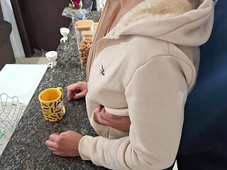 A stepdaughter is surprised while having breakfast.