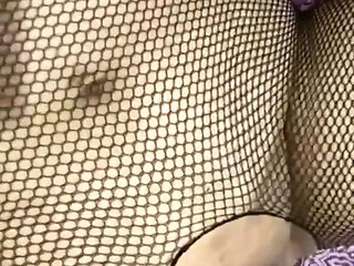 Wildenglishbbw laying in bed in fishnet body suite