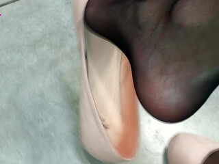 Dangling in Rose Ballet Flats in a Store