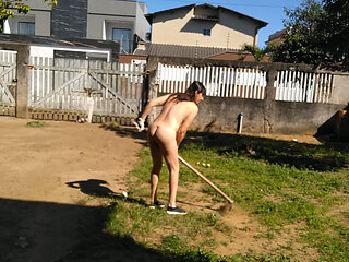 Housewife working naked in front yard while people was walking on street