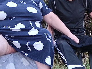 Stepmom in a Park Fingering My Dick on a Bench