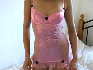 Super Hot Young Brunette Takes Her Pink Lingerie off