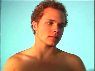 Horny twink watching himself masturbate