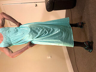 Beautiful green night gown with a sexy black body suit underneath