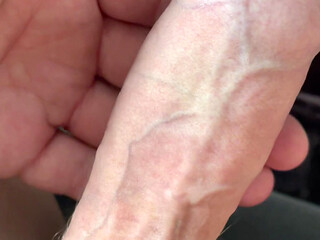Hard cock with veins squirts sperm