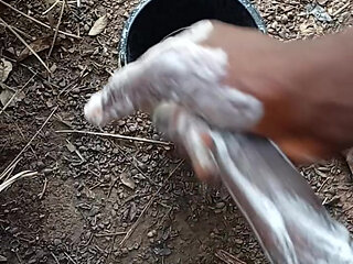 A boy masturbating inside his bathroom with soap