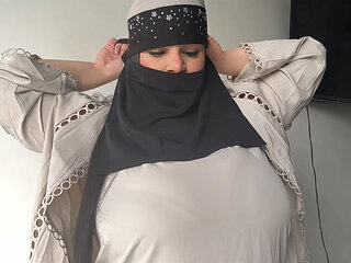 American teen big titty whore tries on Niqab
