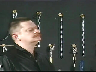 Leather wearing sub gets dominated by her masked master