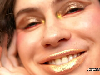 Extremely Shiny Metallic Golden kiss Close up