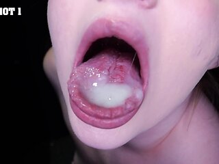 Girls suck and swallow cum through a gloryhole - close up