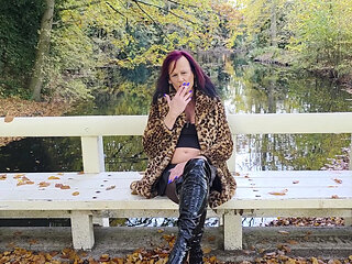Shemale Mistress NaomiPerv relaxing in the fall woods while enjoying a smoke!