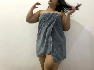 Beautiful girl who is having fun playing with her genitals to her own satisfaction