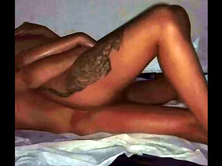 Romantic couple'_s massage with candles and gliding movements.