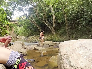 Unknown woman gives me a handjob in a river, fills her breasts with milk
