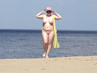 Juicy Woman Walking Naked on Beach