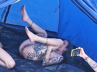 Bottle flipping game on the beach leads to unforgettable holiday fun with two stunning women