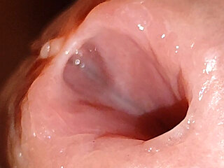 Wide Hole Filled with Pre Cum in Close up