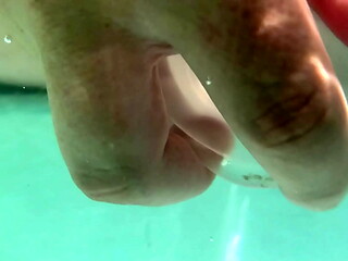 Underwater creampie and dildo in pussy