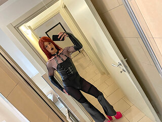Gothic sissy in chastity anally trains with her dildo, accompanied by valga and handcuffs