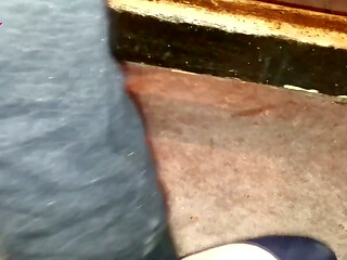 Dangling in Blue Ballet Flats in a Bar