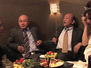 Cute Japanese Slut Servicing Three Guys in the Club