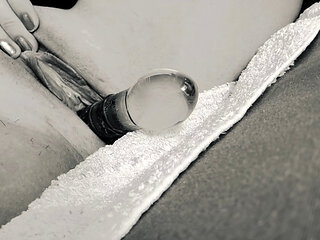 She lets the glass smack