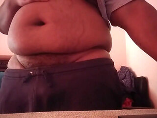 Chubby nonbinary standing masturbating