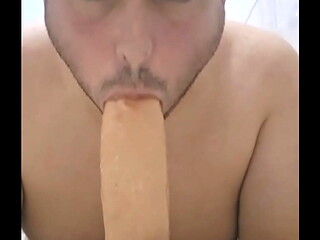 Dutch fag sucking dildo